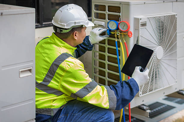 Professional Air Duct Cleaning technician working in Salem, NC